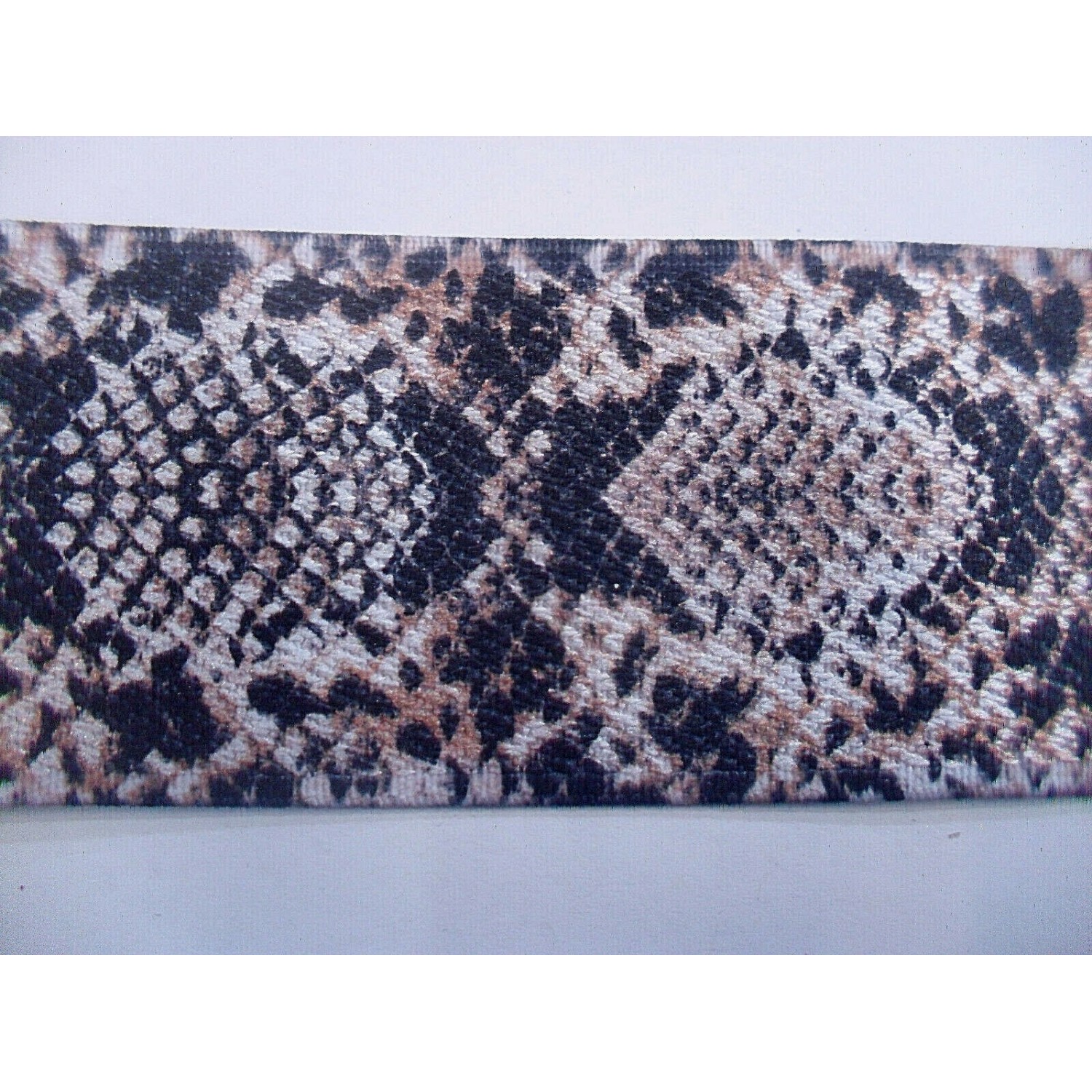 NOVITA' MODA 1 METRO BORDURA ELASTICA PITONATA EFFETTO METALLIZZATO H. 5 cm.