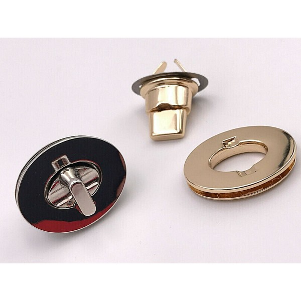CHIUSURA OVALE PER RIFINITURE BORSE E ACCESSORI MISURA 3,5X2,7 cm.