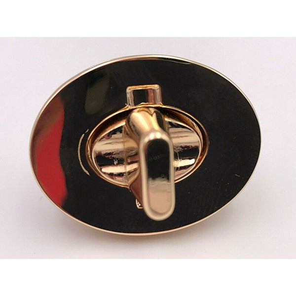 CHIUSURA OVALE PER RIFINITURE BORSE E ACCESSORI MISURA 3,5X2,7 cm.