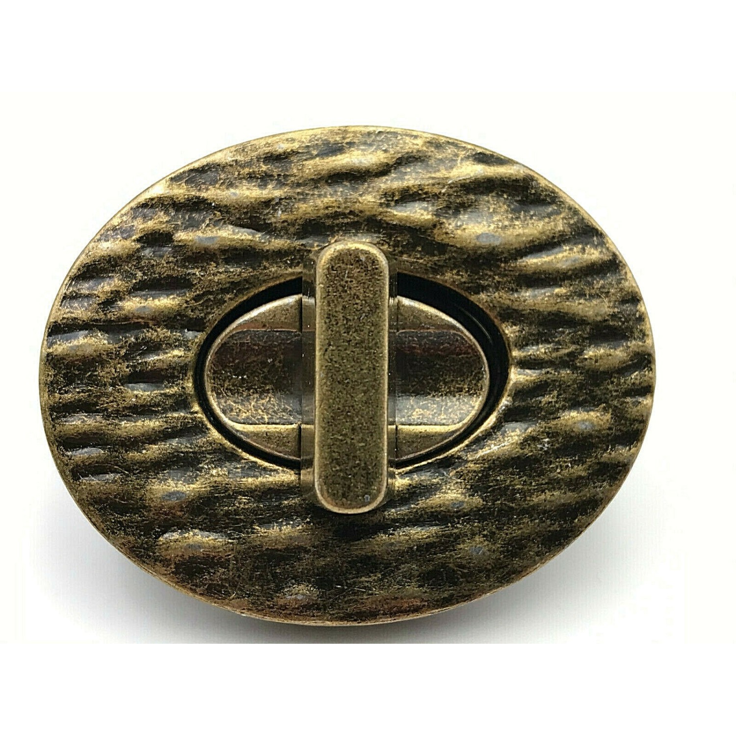 CHIUSURA OVALE LAVORATA PER RIFINITURE BORSE E ACCESSORI MISURA 4,6X3,7 cm.