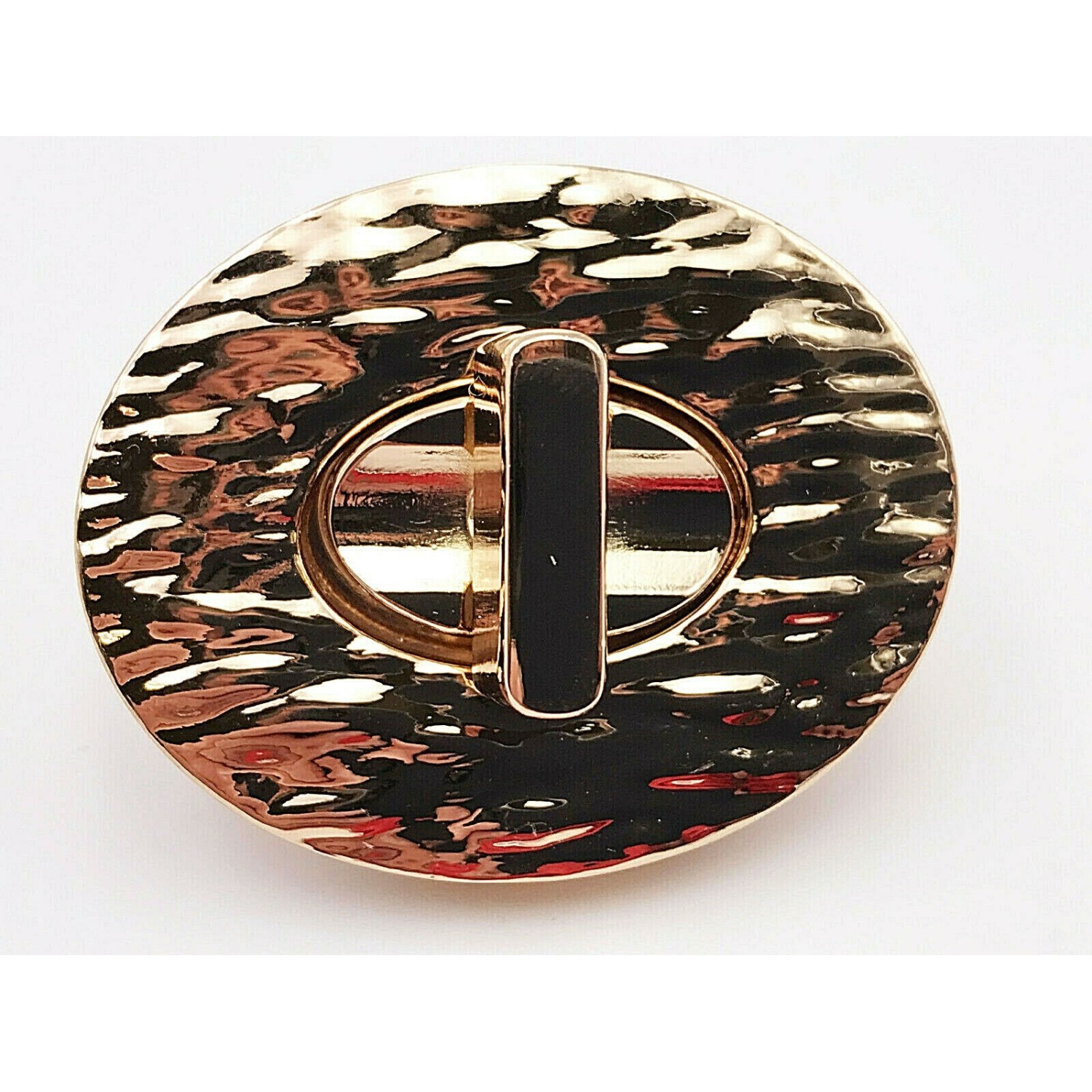 CHIUSURA OVALE LAVORATA PER RIFINITURE BORSE E ACCESSORI MISURA 4,6X3,7 cm.