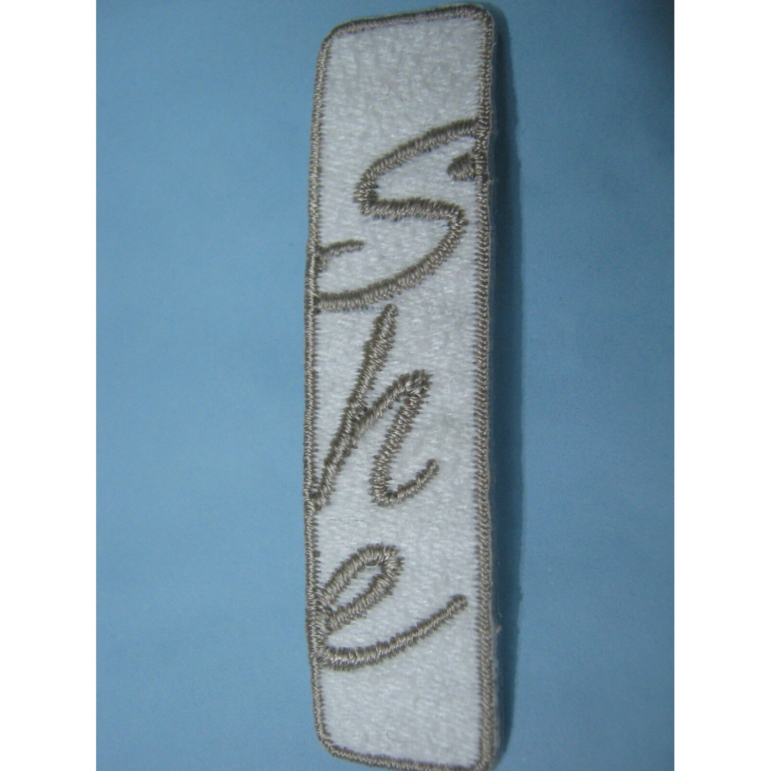 TOPPA PATCH APPLICAZIONE RICAMO TESSUTO TERMOADESIVA O DA CUCIRE DIME. 1,5X6 cm.