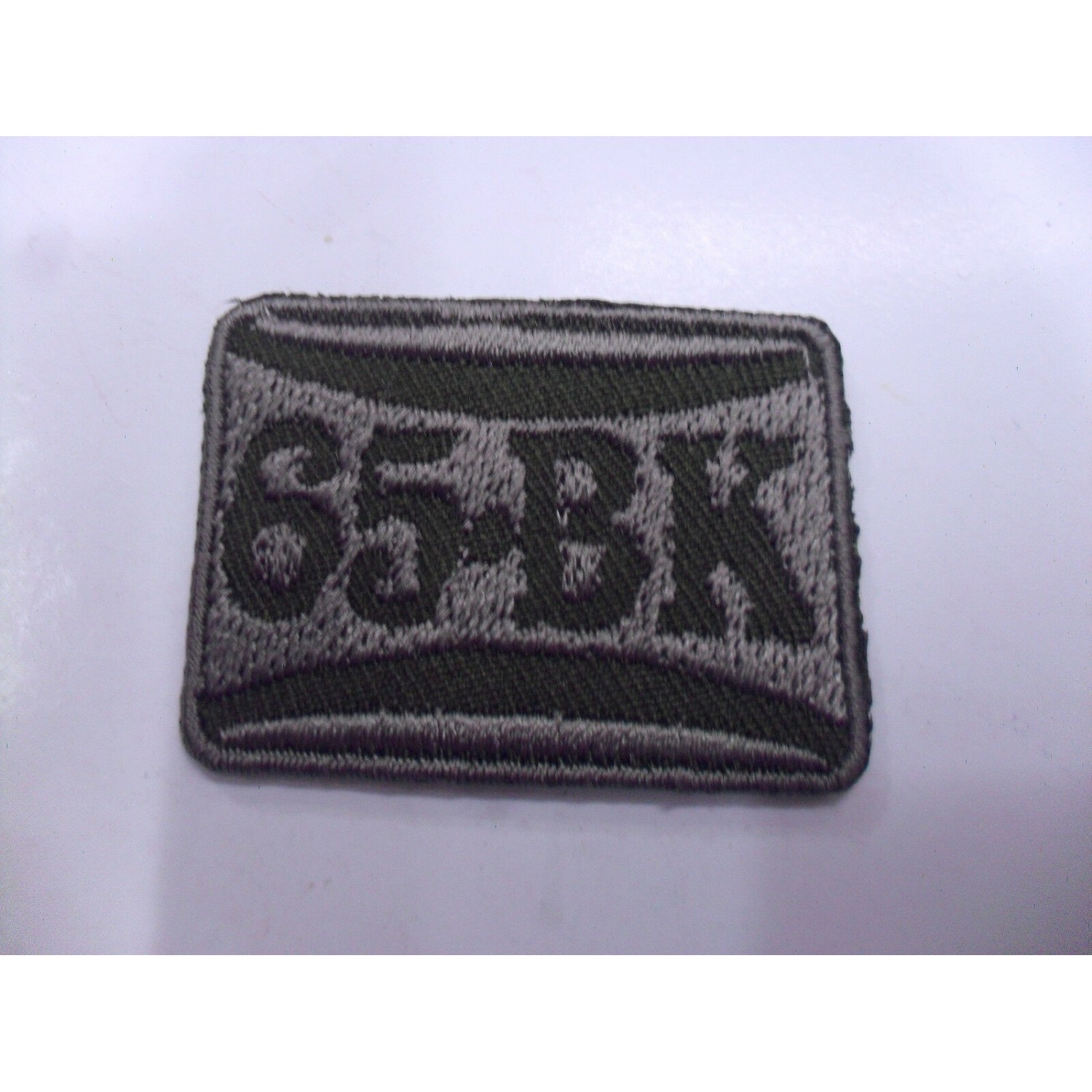 TOPPA PATCH APPLICAZIONE RICAMO TESSUTO 65BK TERMO O DA CUCIRE DIAM 3,9X2,8 cm.