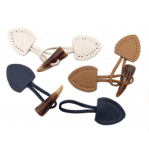 Alamaro bottone unisex in ecopelle con corno in resina