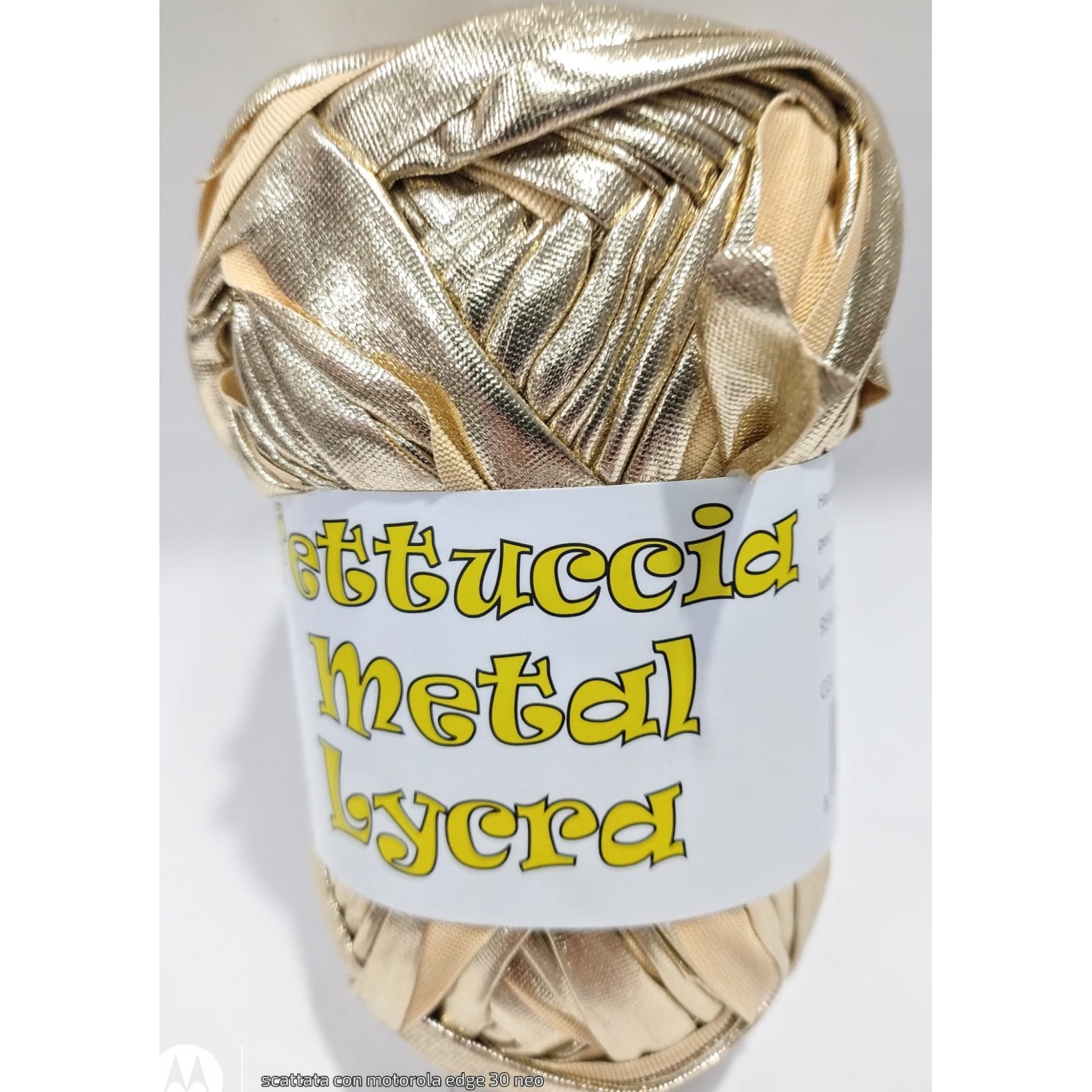 Gomitolo di fettuccia metallizzata x borse e varie elastica, peso +- 100 gr. 45 mt.