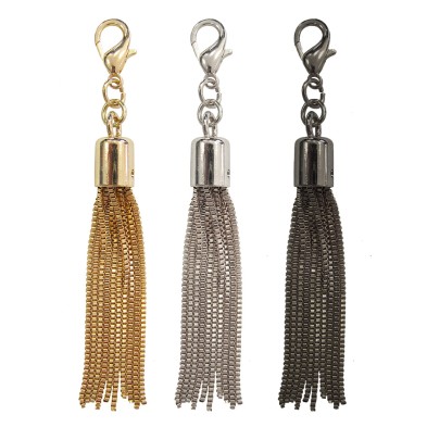 Nappa nappe metallo altezza 12/13 cm. circa con moschettone, decorazioni varie